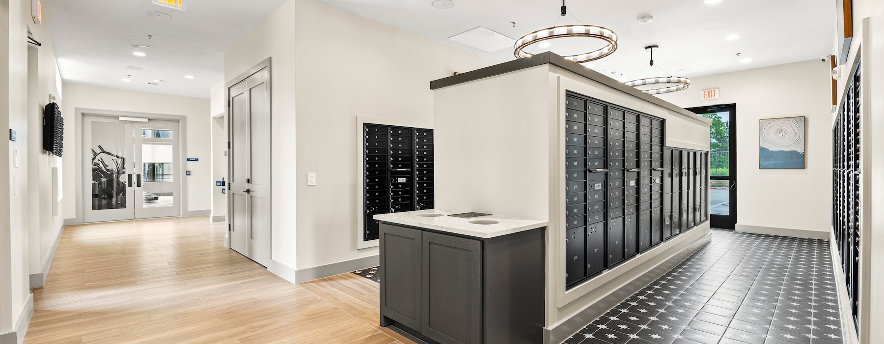 a mail room with black lockers
