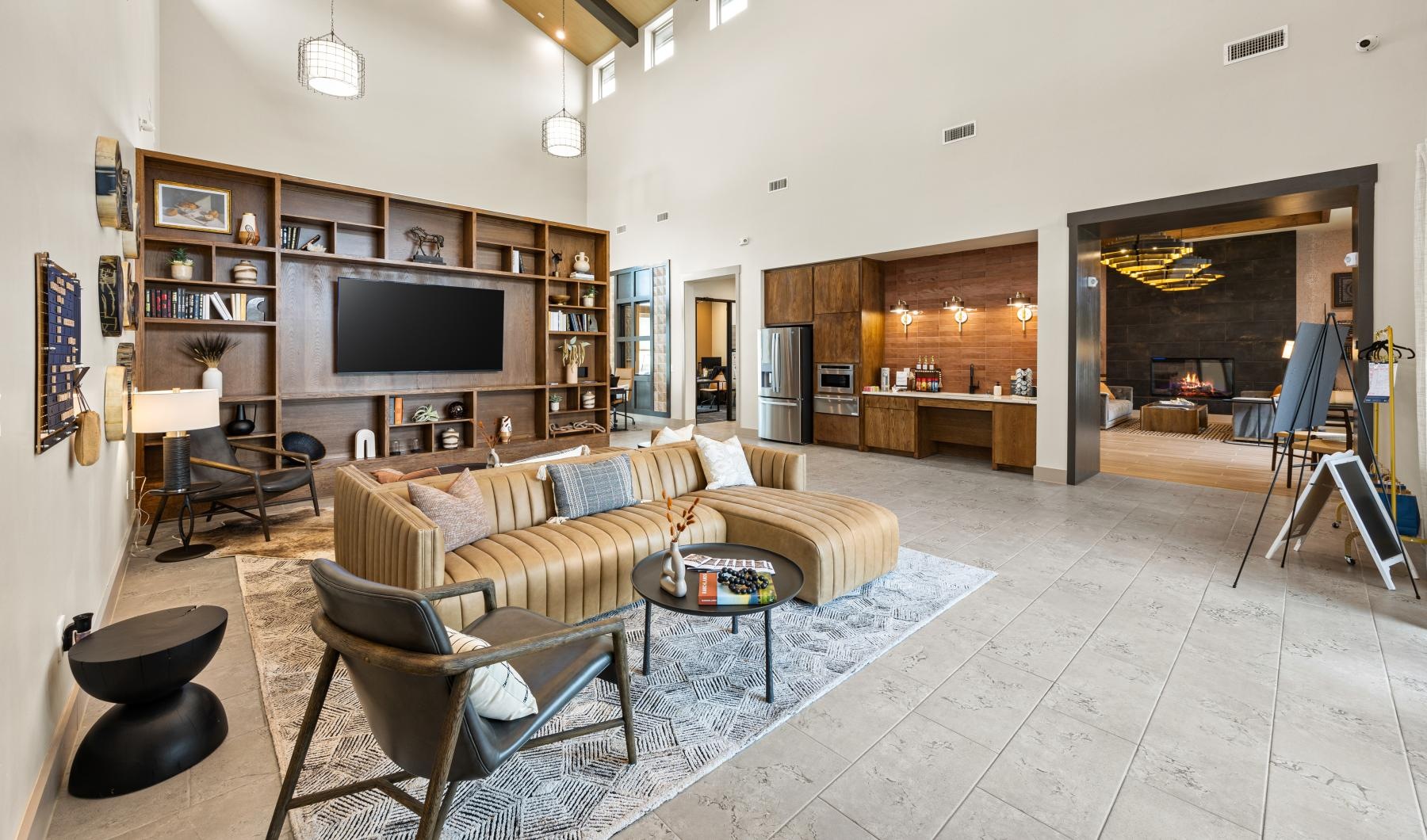 a clubroom with a tv and a couch